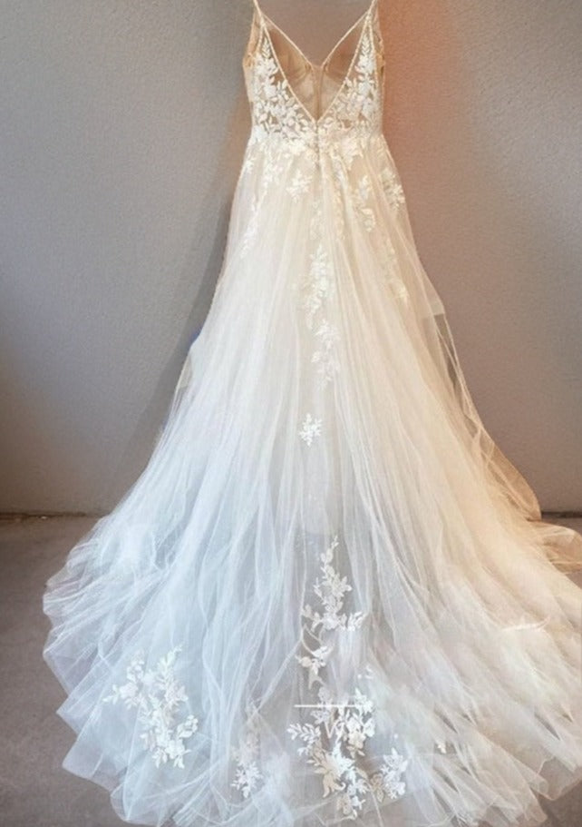Classic Backless A-line lace wedding dress displayed elegantly