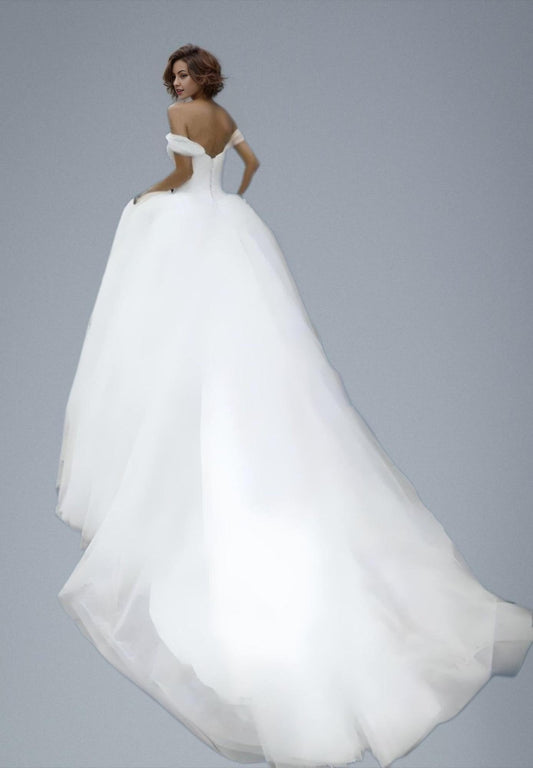 Beautiful Bride showcasing Long Train and Back of the Ball Gown Wedding Dress