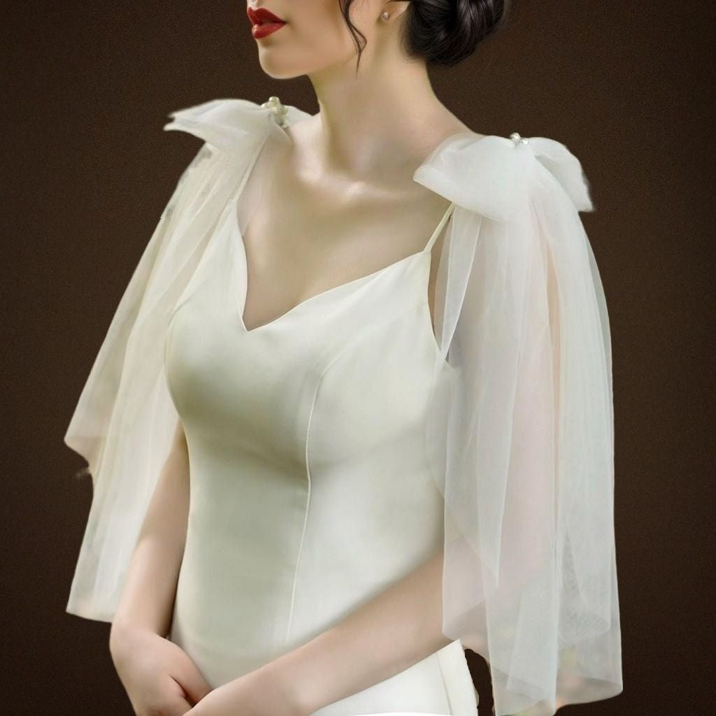 Voile d'ailes de mariée avec nœuds