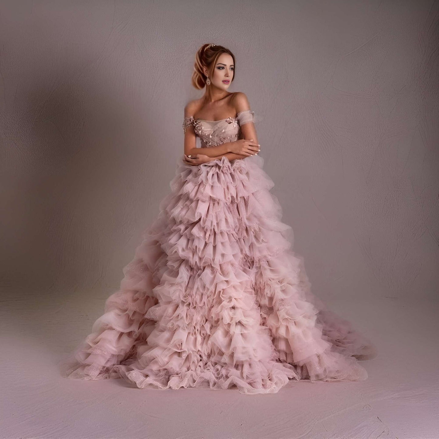 Prom Night Ready in Pink: The model stands confidently, ready for a night out, emphasizing the glamorous appeal of the tiered HARVIE dress.