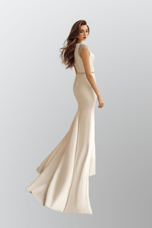 Satin Wedding Dress with Sweep Train: The bride walking away, showcasing the flowing sweep train and the elegant buttons down the back.