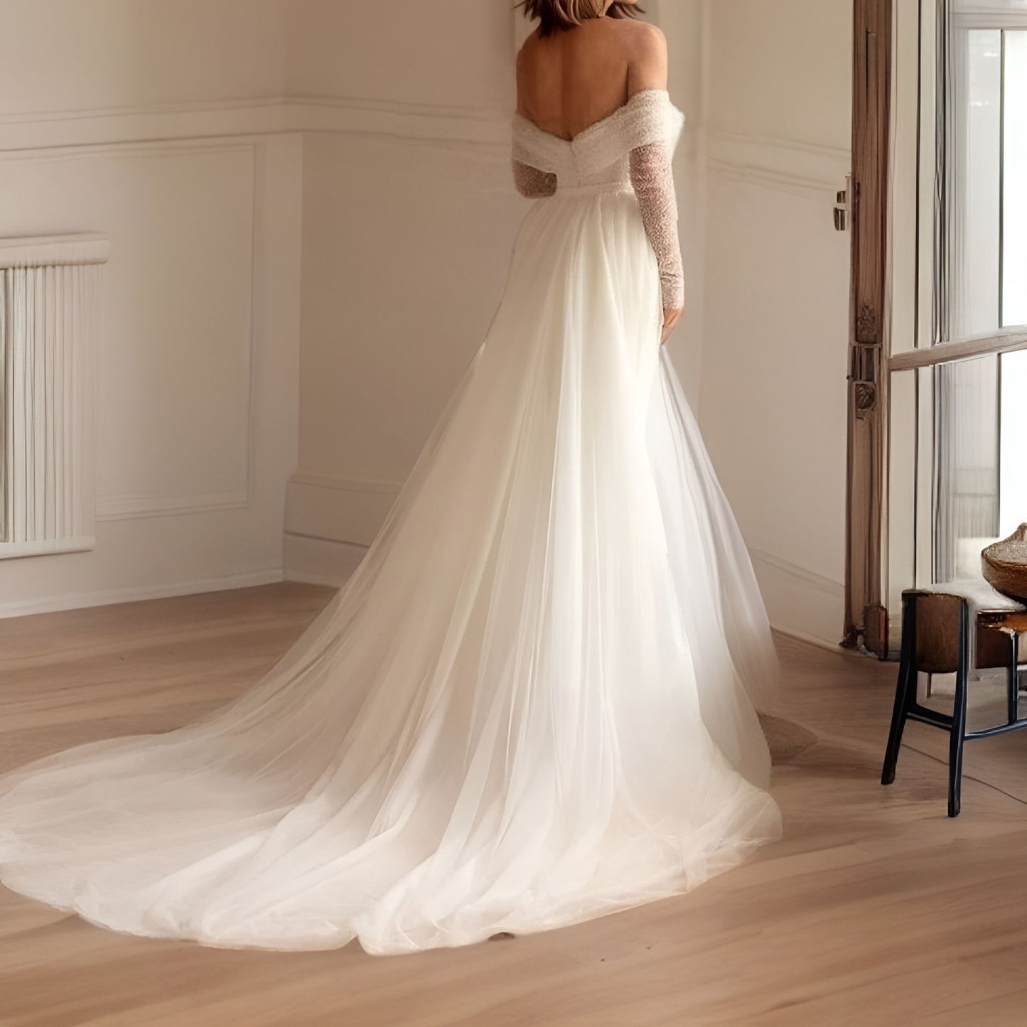 Bride from back in a sequined off-the-shoulder mermaid gown with a detachable A-line tulle overskirt, perfect for a dramatic wedding look.