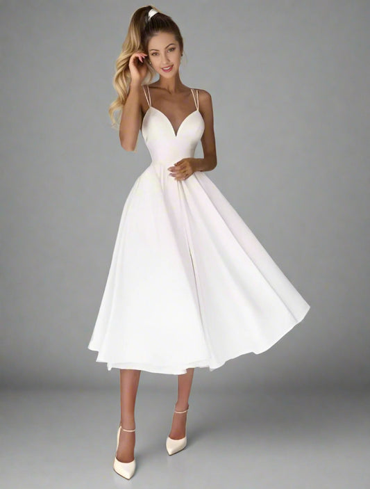 Happy woman in Elegant tea-length wedding dress featuring a pleated skirt and V-neckline, ideal for special occasions.