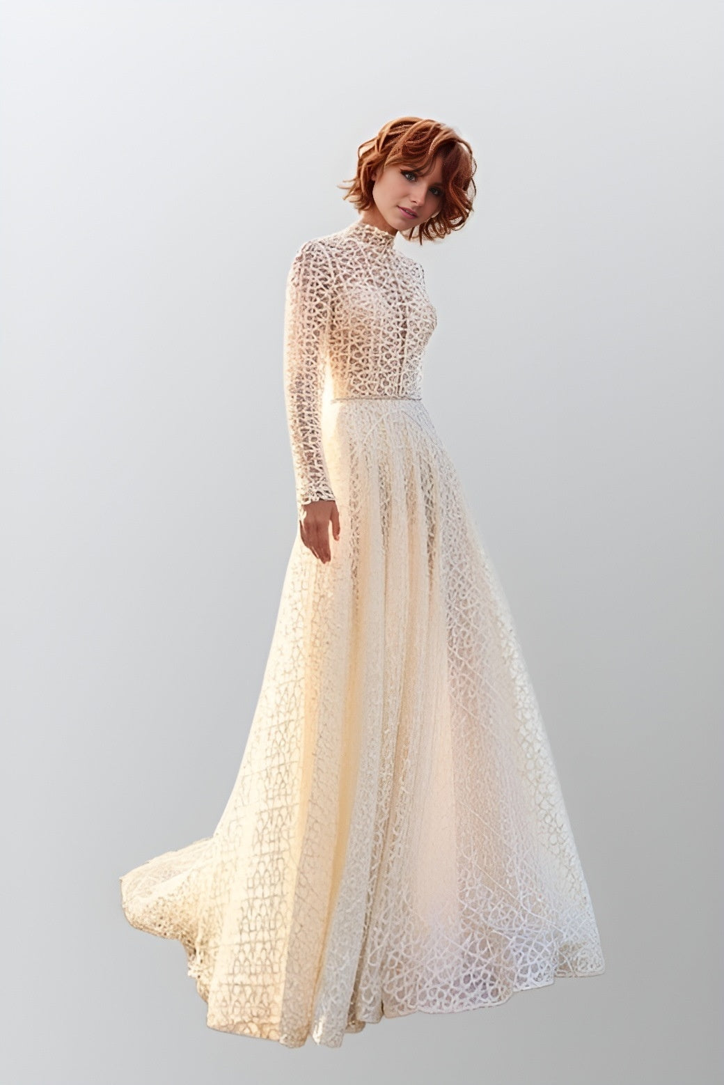 Bride with short ginger hair showcasing a glittered lace gown with high neck, long sleeves, and a sweeping train.
