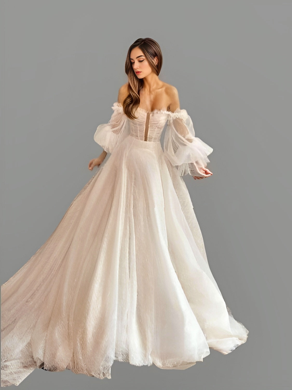 Bride showcasing a sparkling glittered tulle wedding gown with fitted top and deep cutout illusion, off-shoulder puff sleeves, perfect for a princess-like bridal style.