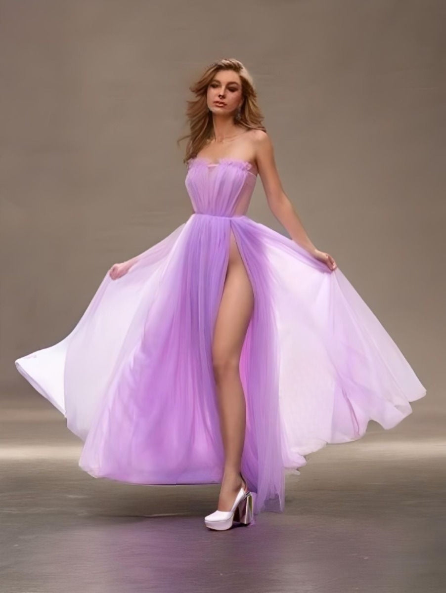 Woman in a lavender prom dress with a high slit, ruched bodice, and see-through sides, showcasing waist high slit.