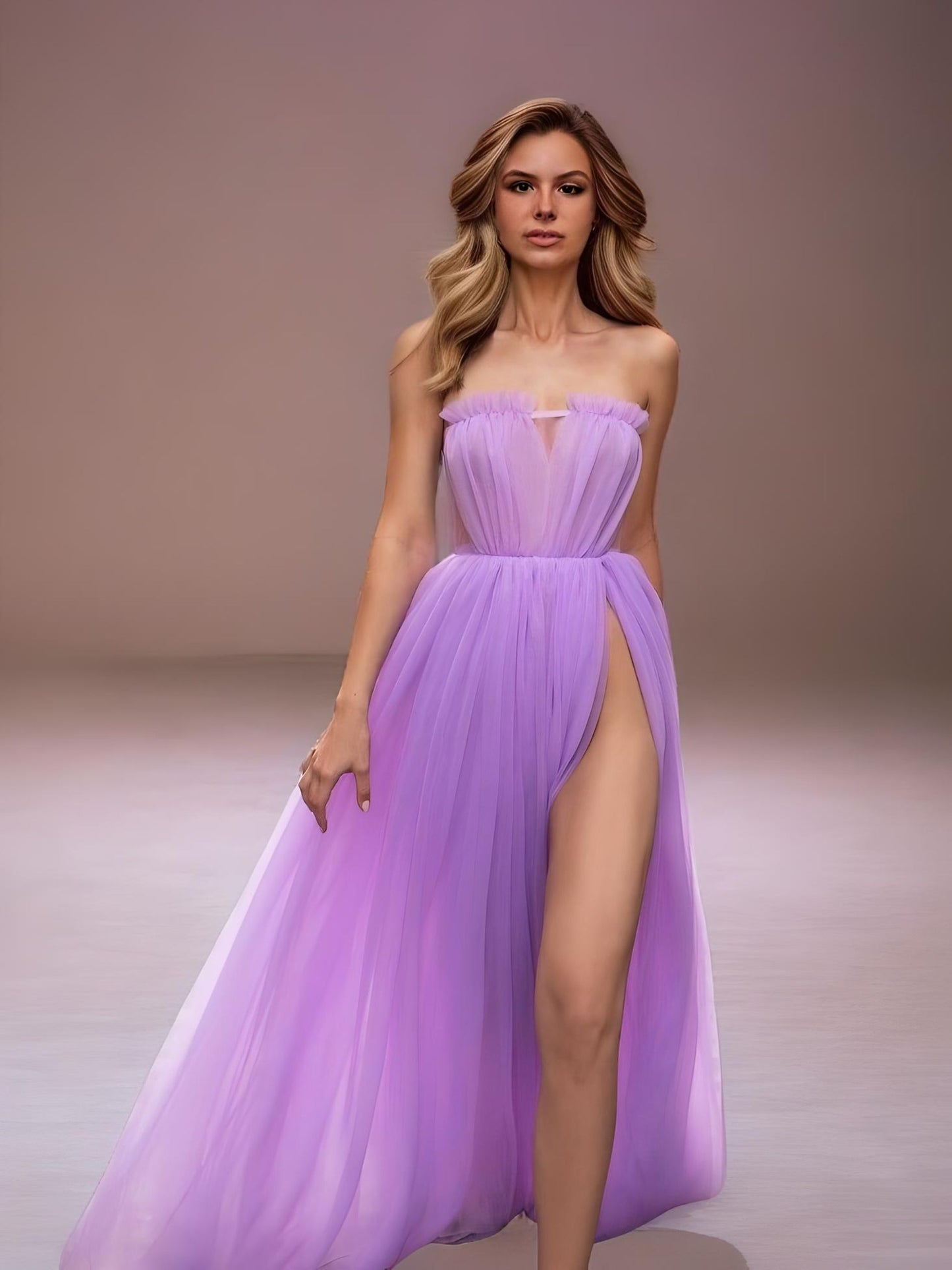Sexy lavender gown featuring a strapless design, pleated bodice, and daring high slit, ideal for a chic and memorable evening look.
