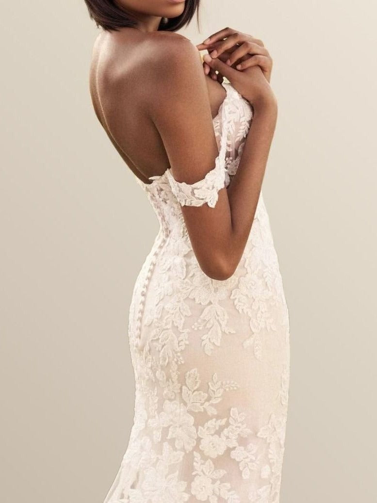 Elegant gown with an off-the-shoulder lace sleeves, full lace overlay designed for a chic and romantic bridal look.