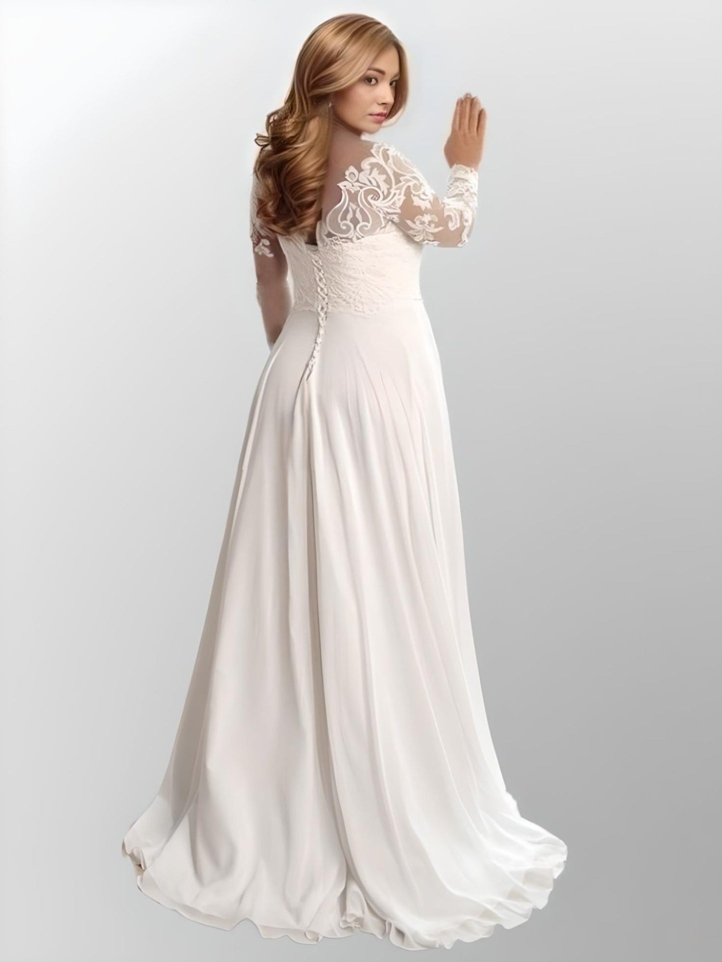 Back view of the LIZA wedding gown showing flowing A-line silhouette.