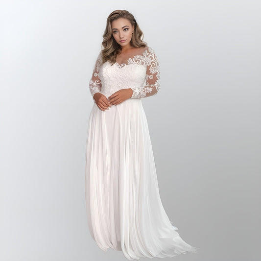 Bride wearing the LIZA Wedding Dress with long lace covered sleeves and chiffon skirt.
