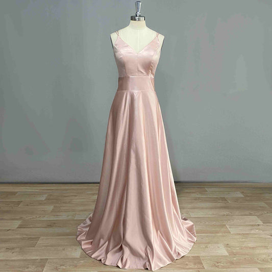 Front view of COSIMA Formal Dress on a figurine, showcasing V-neckline and A-line silhouette