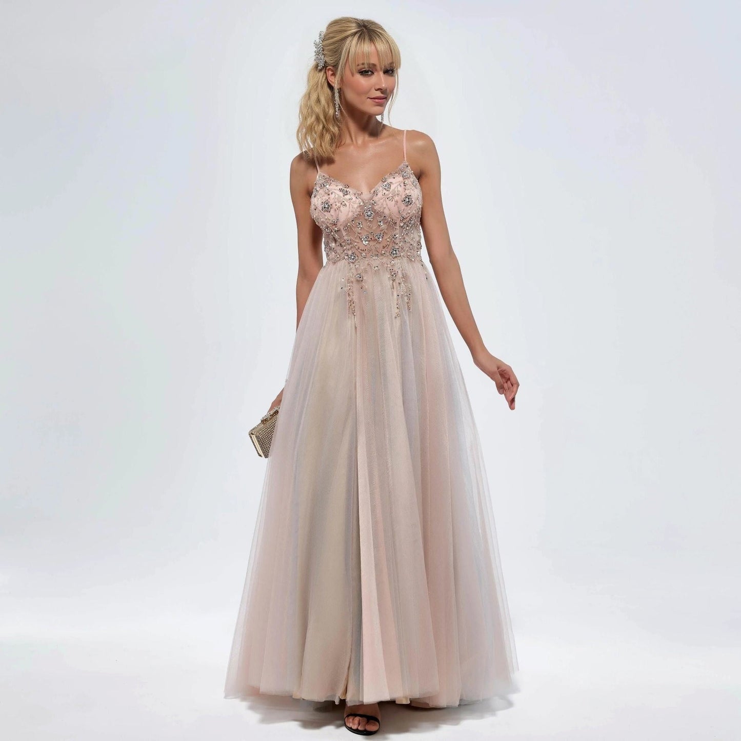 Elegant blush flowy evening dress with spaghetti straps and rhinestone bodice