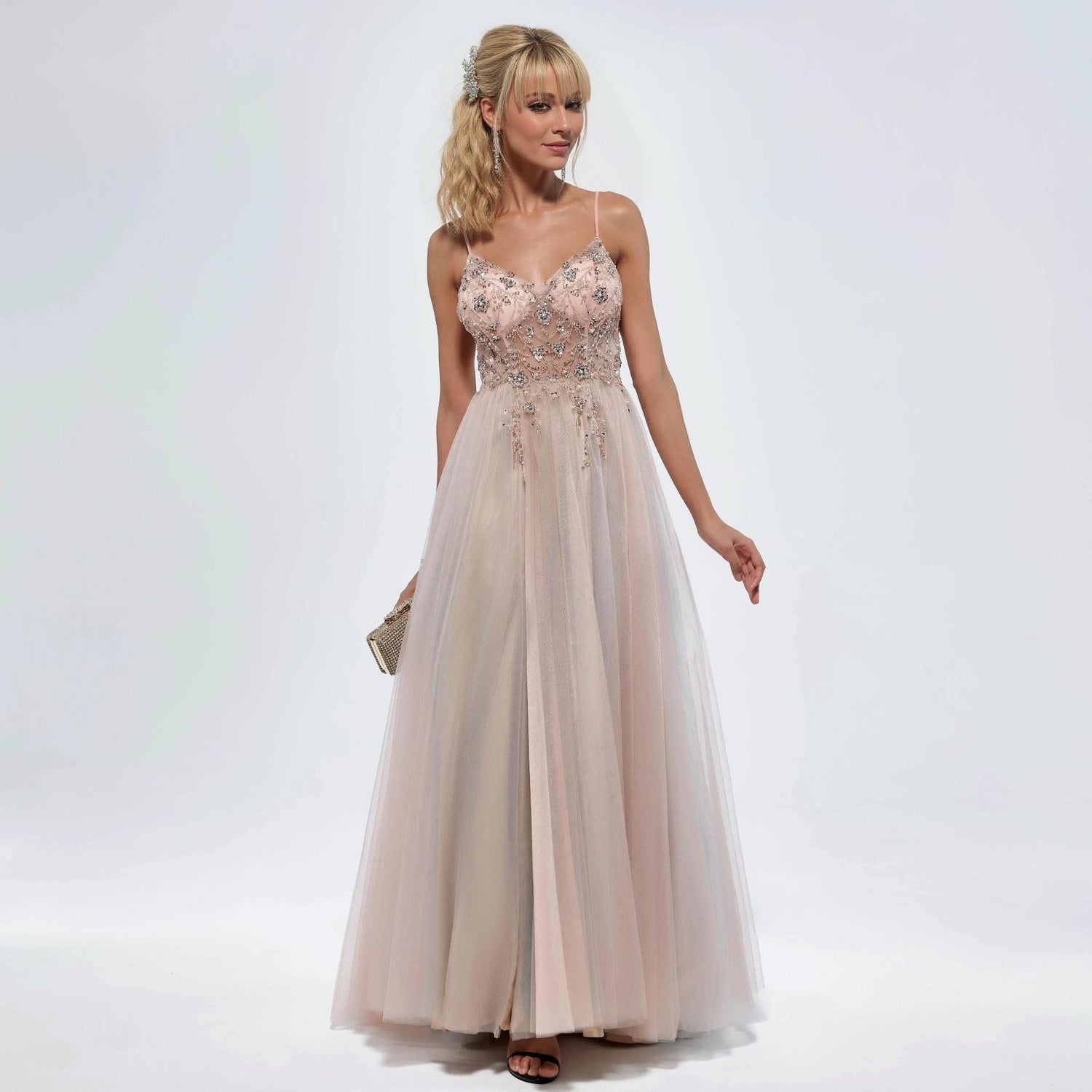 Elegant blush flowy evening dress with spaghetti straps and rhinestone bodice