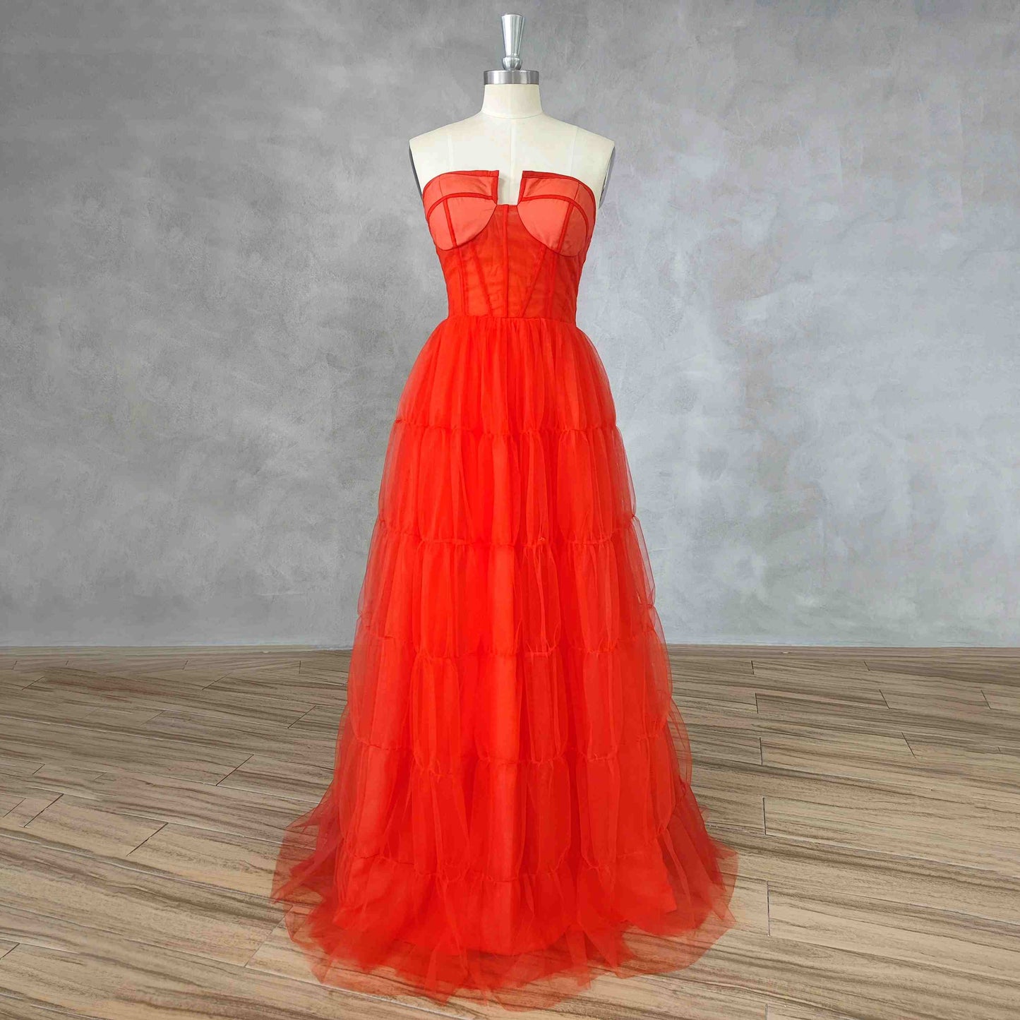 Figurine wearing FARRAH Formal Dress with sweetheart neckline and strapless design.