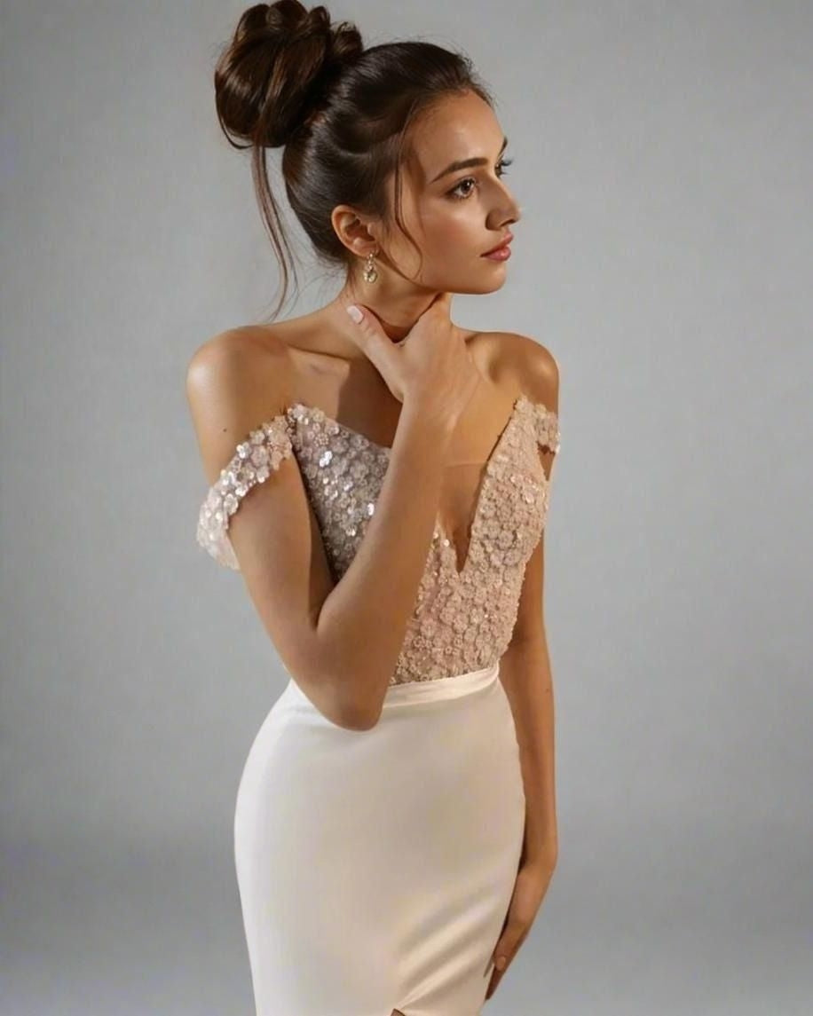 Bride in form-fitting mermaid dress with with shimmering sequins and lace.