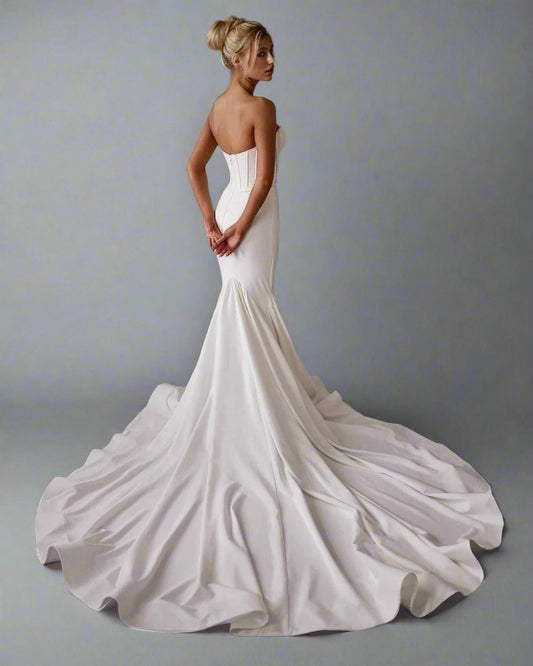 Back view of Oleandra wedding gown with lace-up back design train