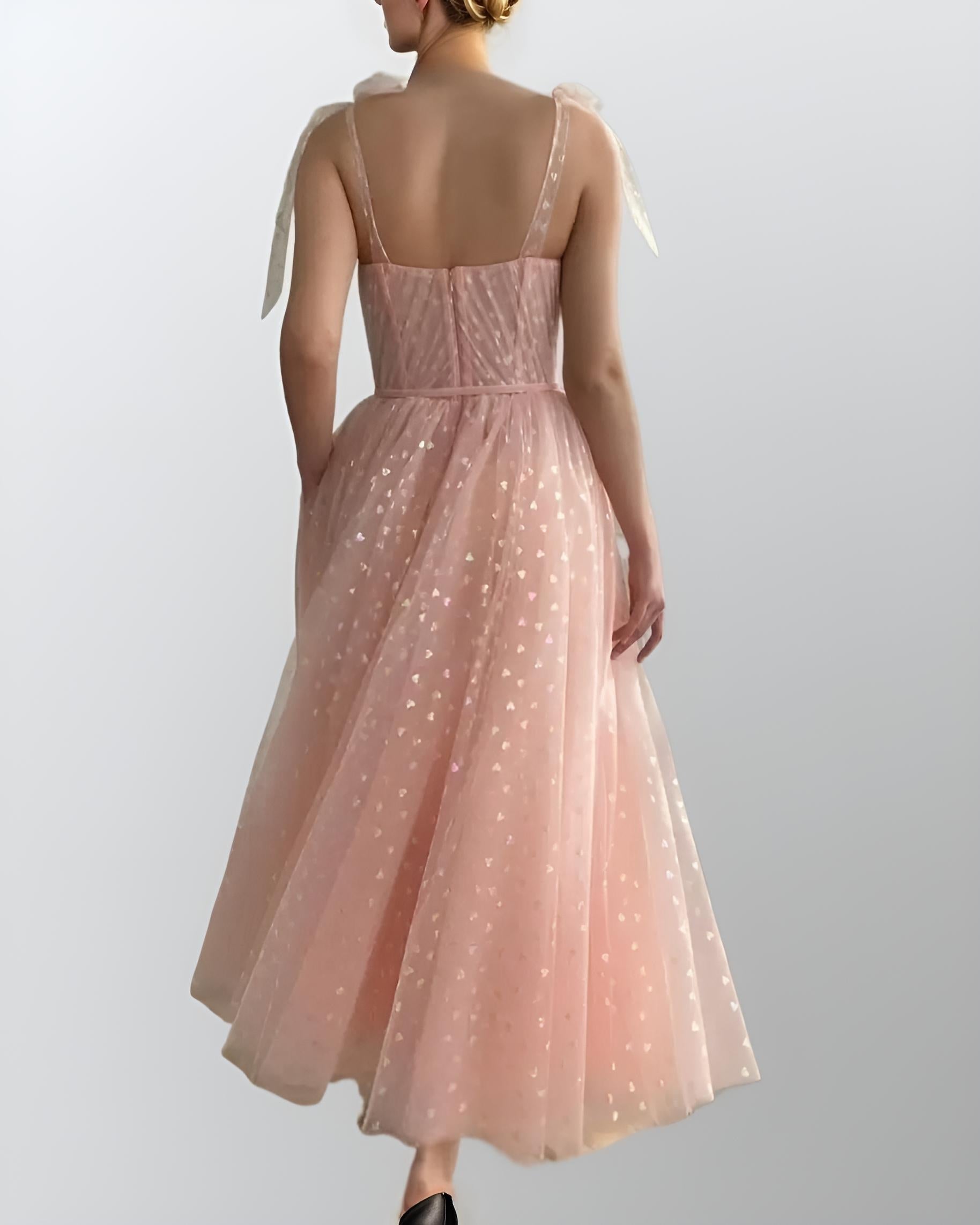 Back of woman showing PETRA formal dress with corset