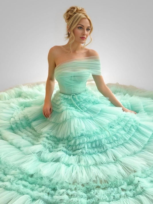 Close-up of the Mint Green Scarlett Dress highlighting its luxurious fabric and flattering fit.