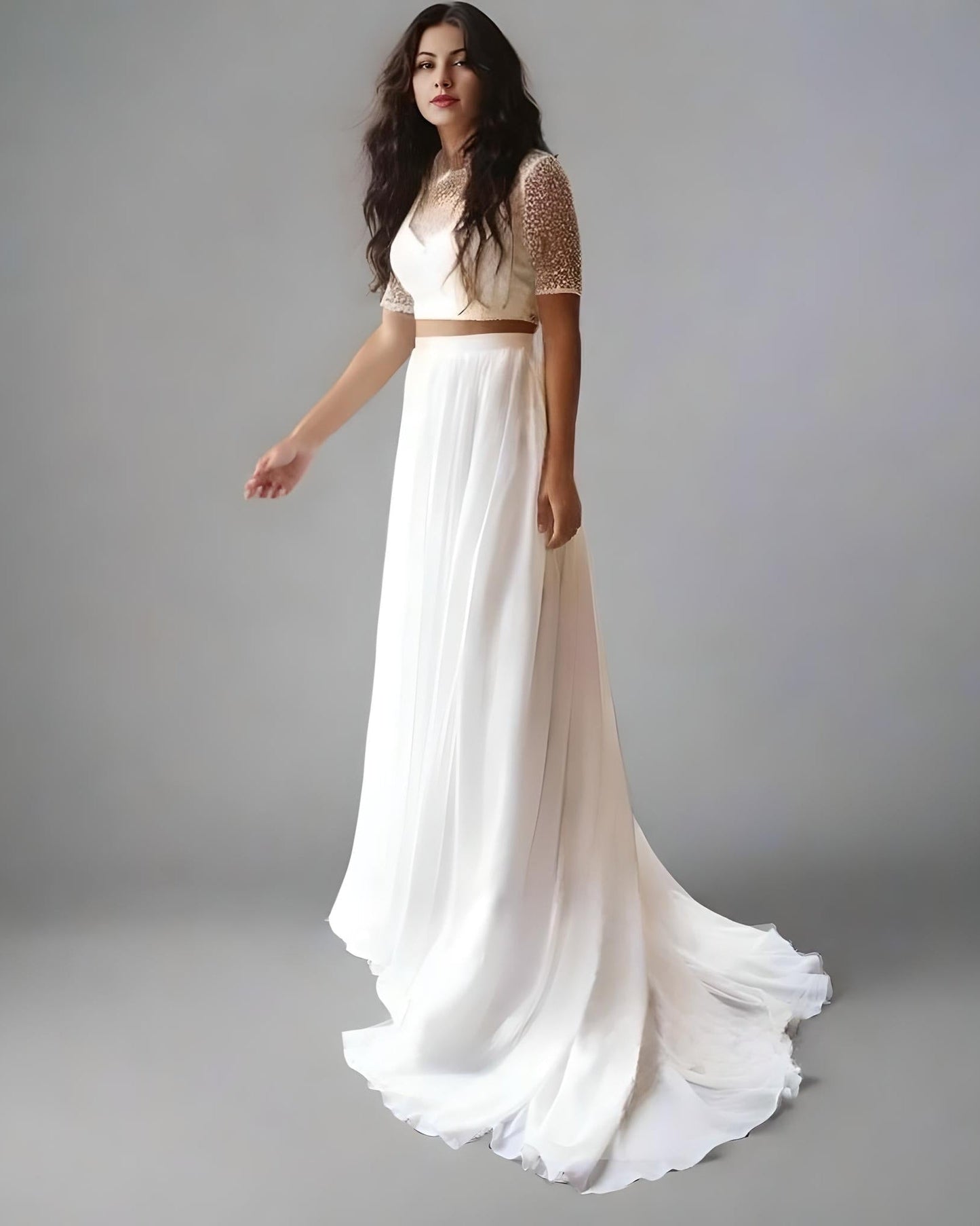 Lightweight two-piece wedding dress for summer and destination weddings with flowing chiffon skirt with lace crop top.