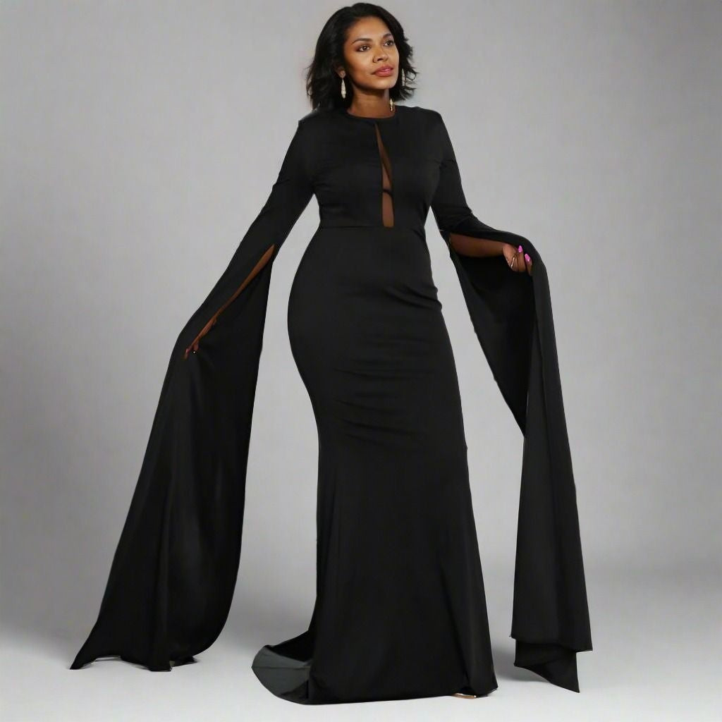 Model posing in the Black Sonya Formal Dress, emphasizing the long sweep sleeves and luxurious cape sleeves.