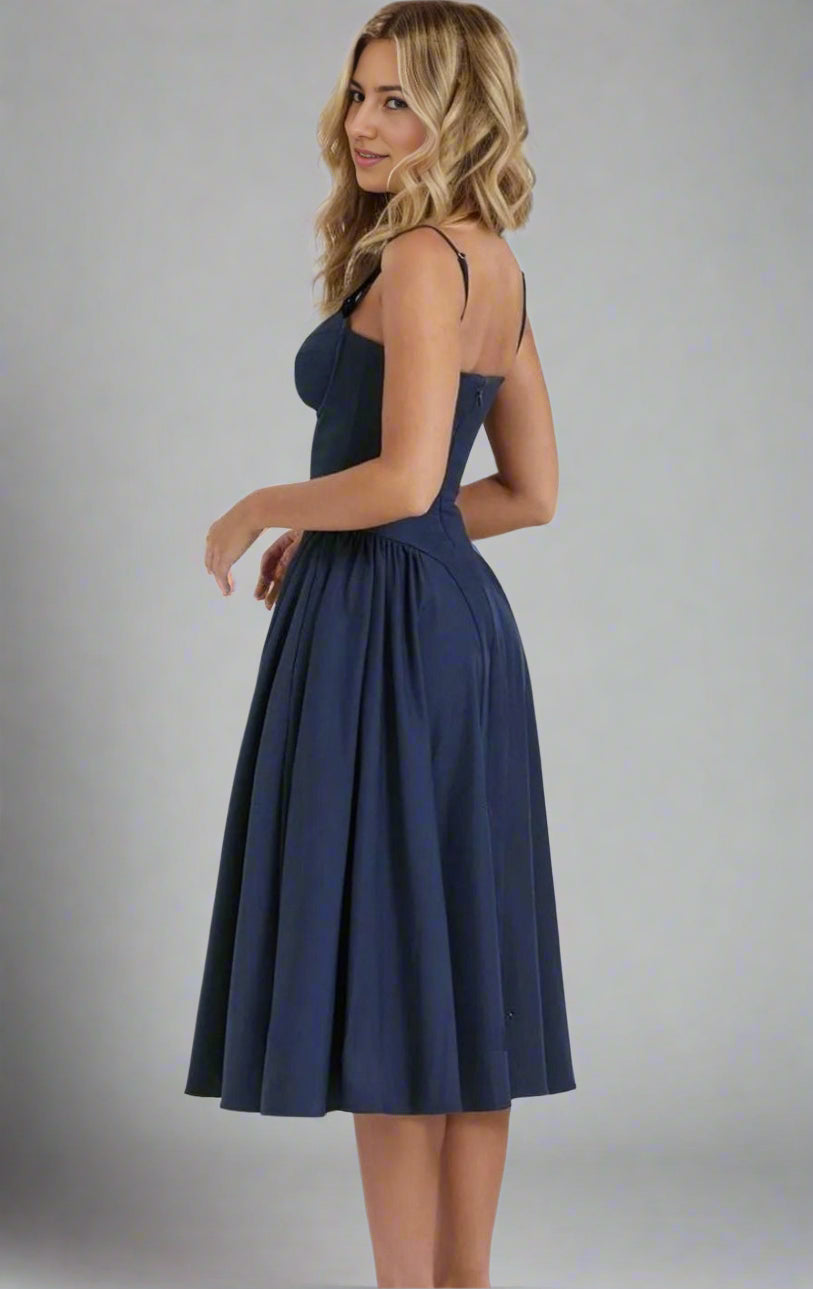 Back view navy blue Talia formal short dress with A-line silhouette.