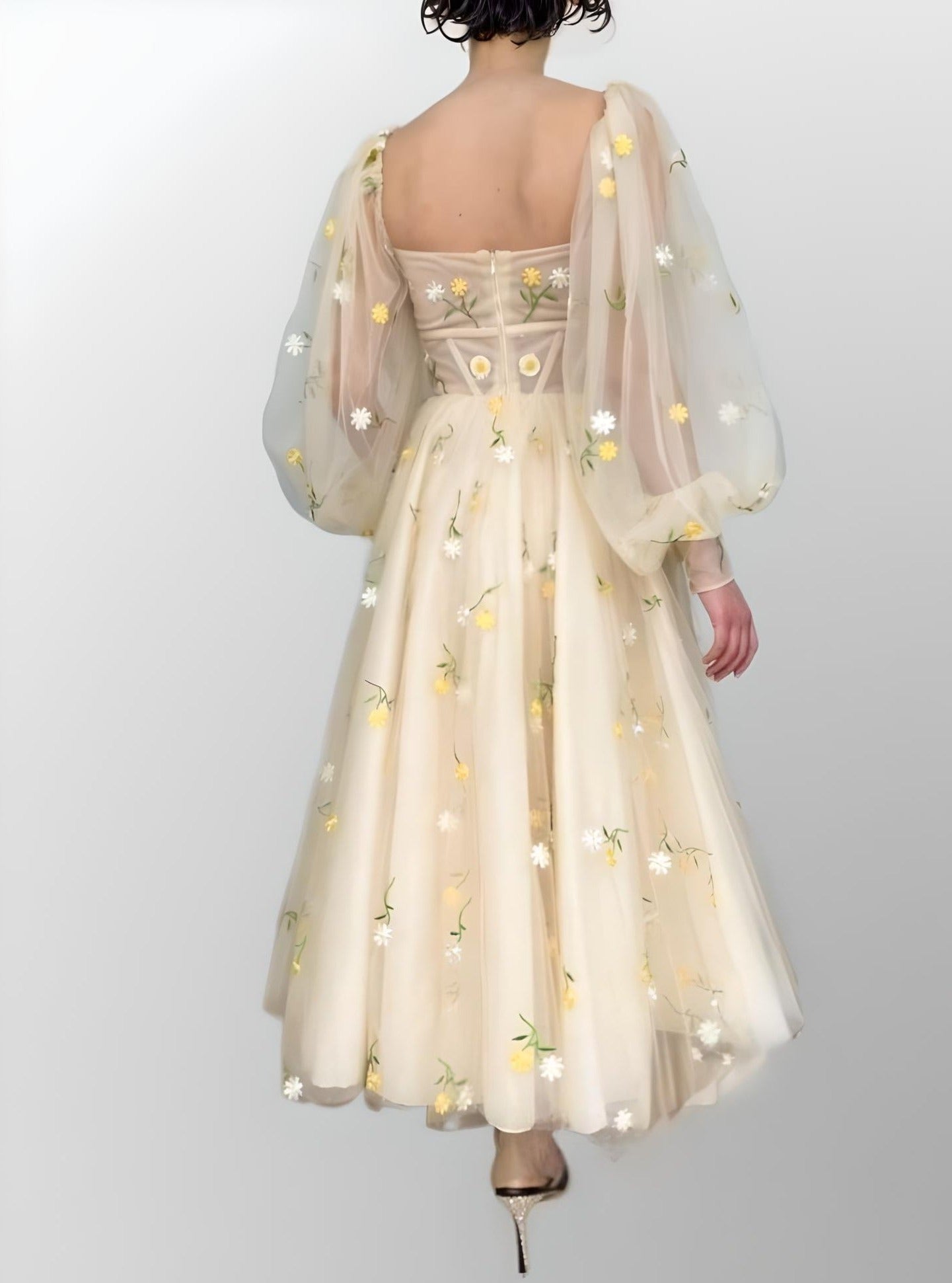 Back view of woman wearing MADISON backless gown