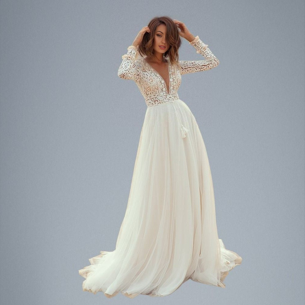 Bride wearing MATILDA Wedding Dress with deep V-neckline