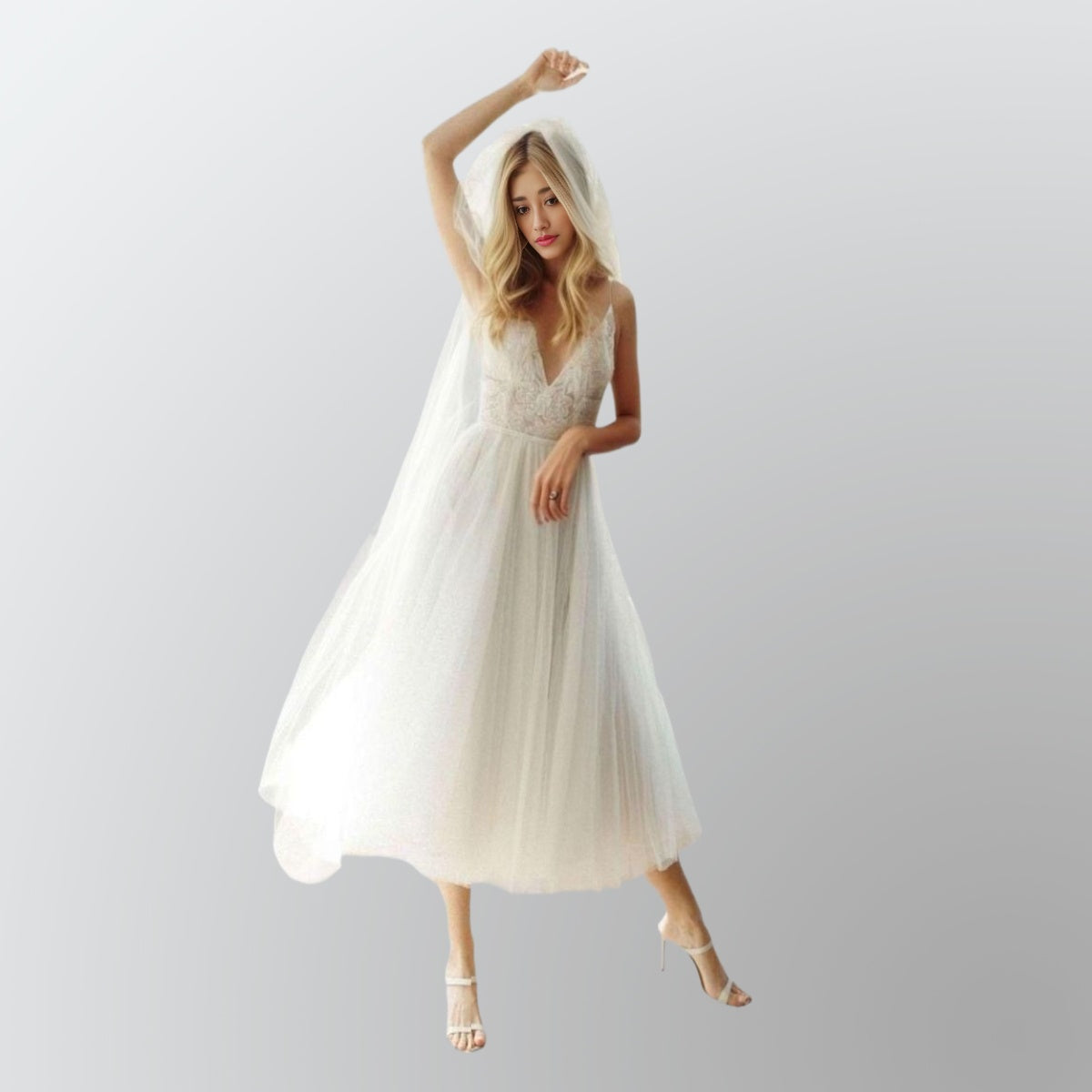 Bride twirling in lace and tulle MATTIE A-line wedding gown