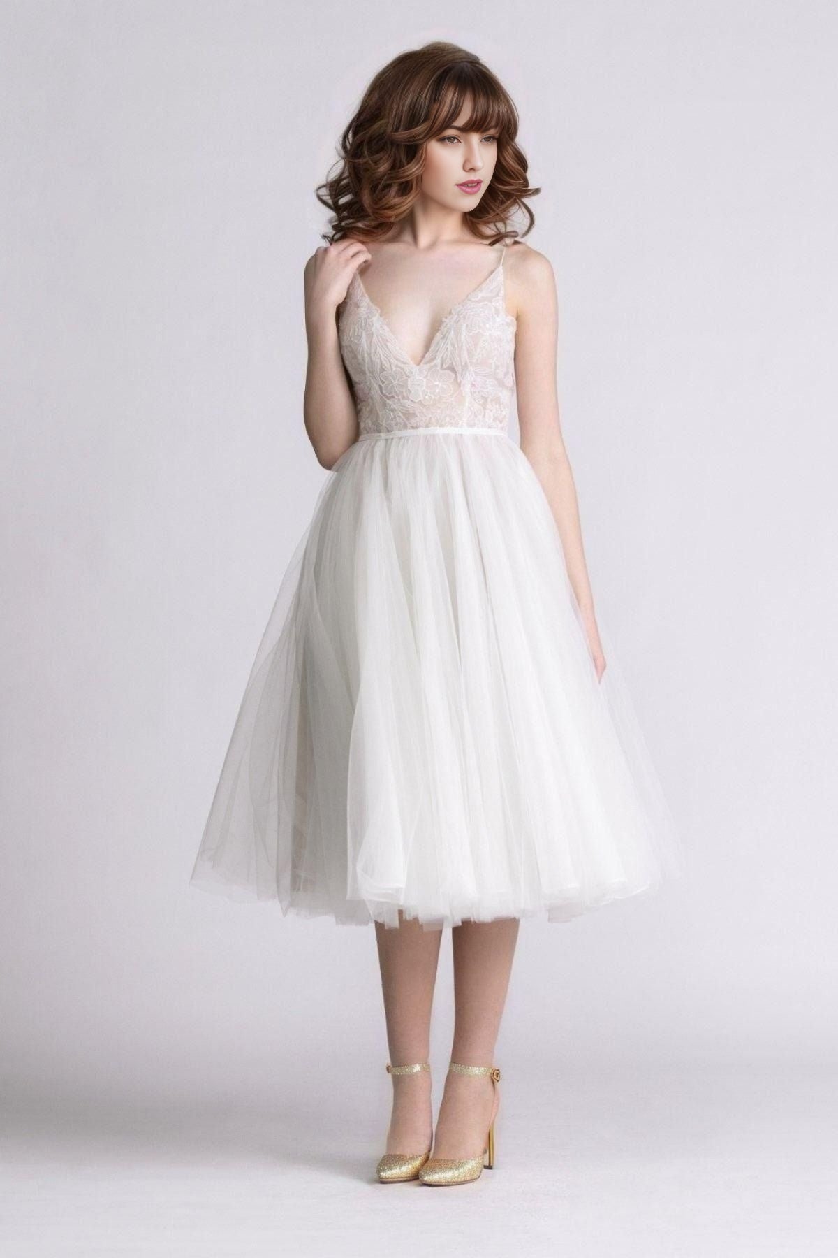 Bride wearing MATTIE Short Wedding Dress with V-neckline