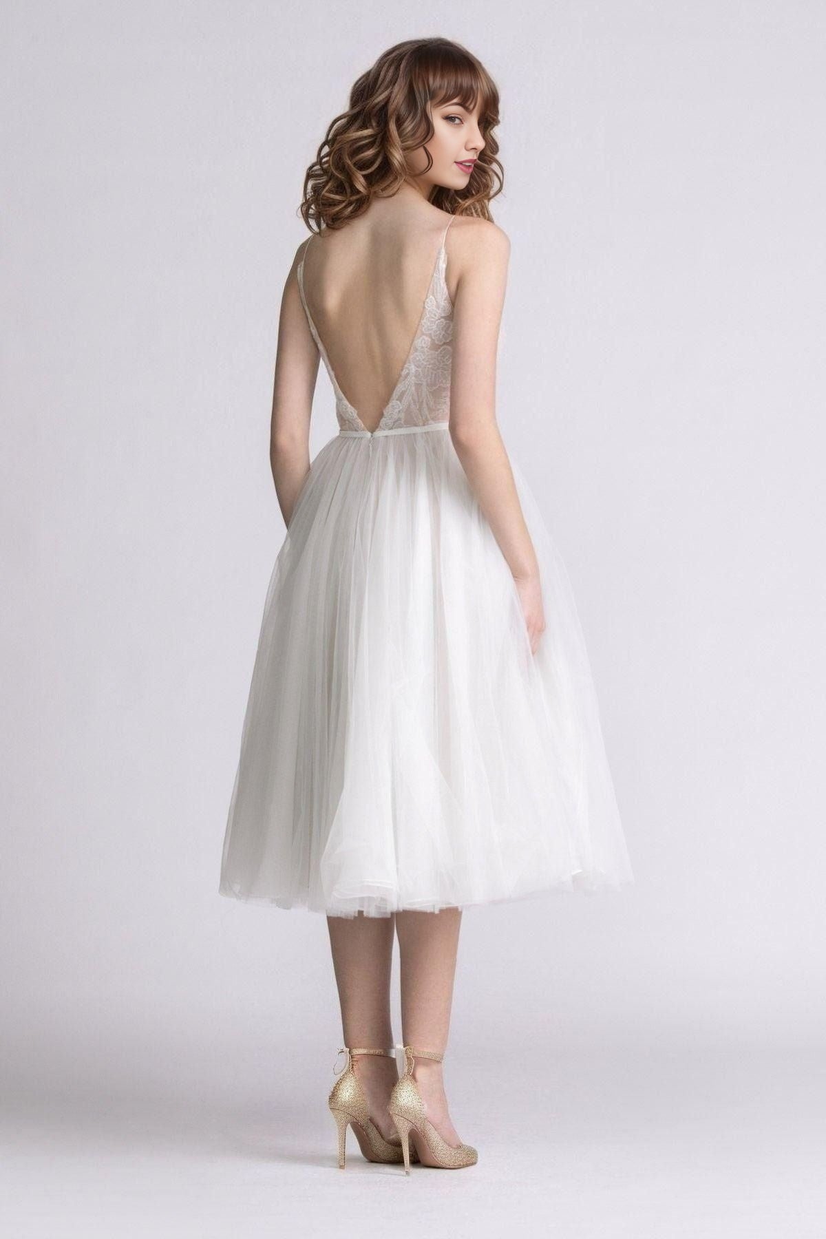 Back view showing backless design of MATTIE Wedding Dress