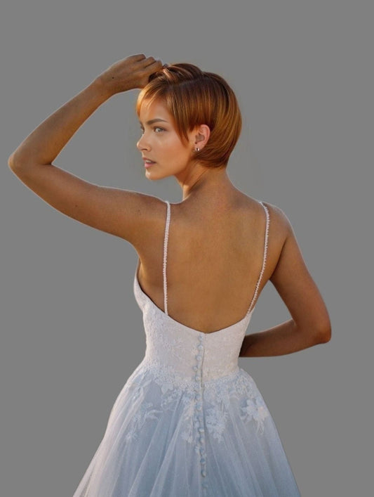 Back view of MAYRA Wedding Dress with buttoned backless design
