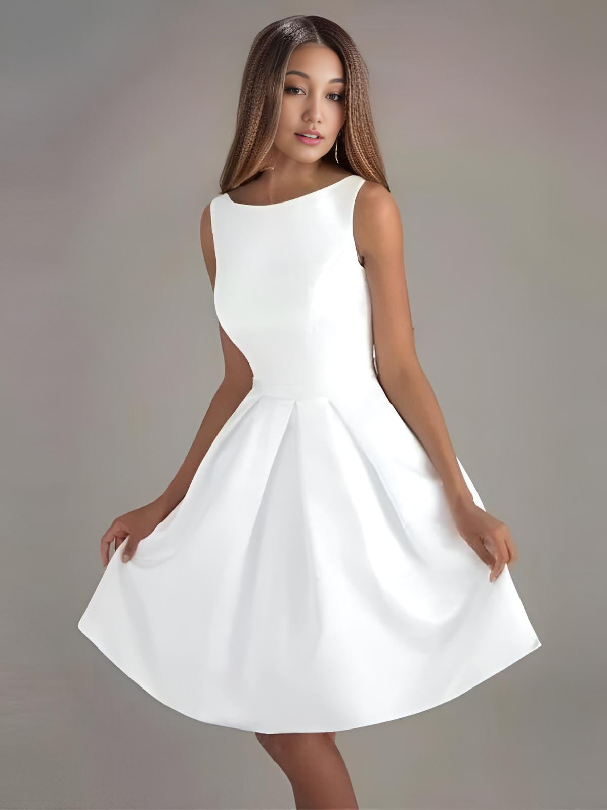 Close-up of satin fabric on MICAH knee-length wedding dress