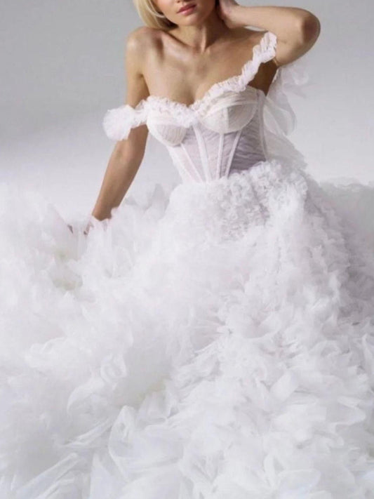 Detailed view of white tiered ruffled tulle fabric on MILA Formal Dress