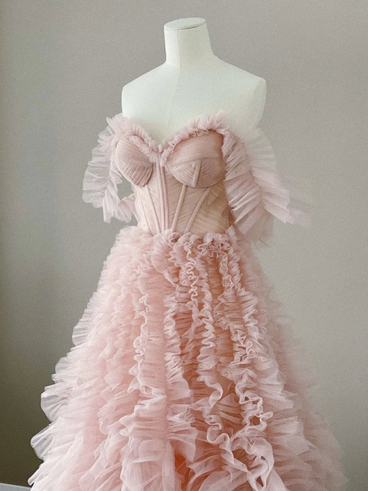 Front view of light pink MILA Formal Dress on a figurine, showcasing tiered ruffles