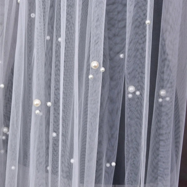 Close view of Milky Way Wedding Veil highlighting delicate pearl arrangement