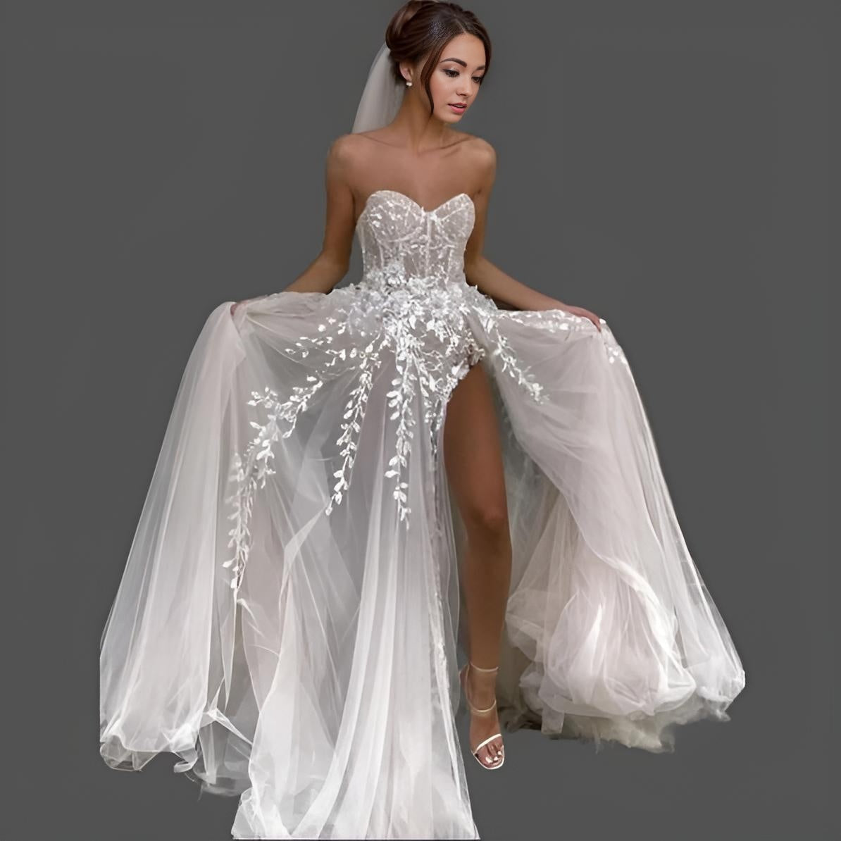 Bride wearing MINA Wedding Dress with sweetheart neckline and floral leaf lace appliques