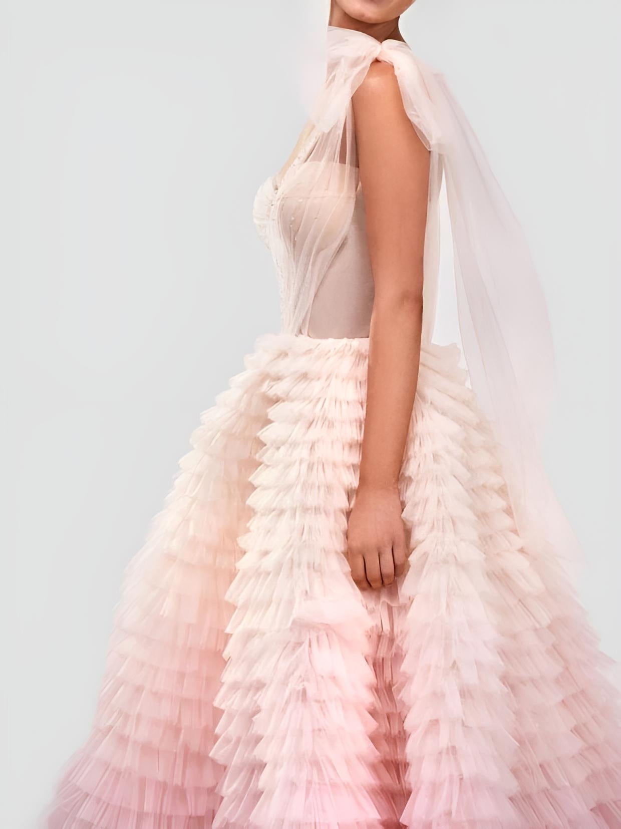 Close view of MINNIE Evening Gown showcasing ruffled layers