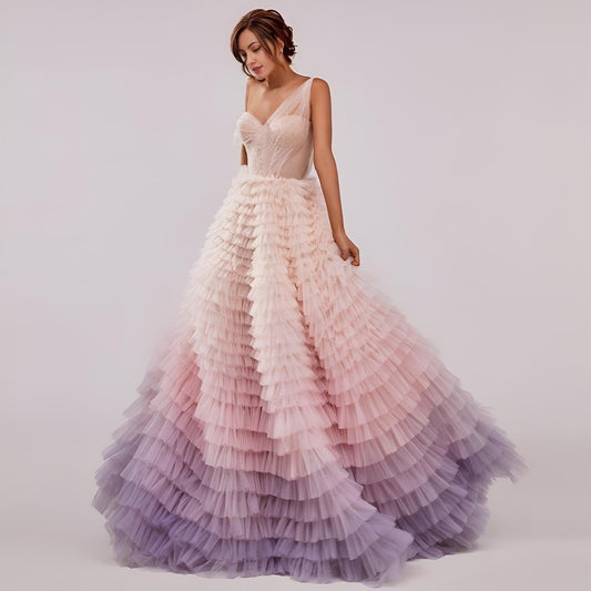 Woman wearing MINNIE Formal Dress with cascading pink and purple ruffled tulle