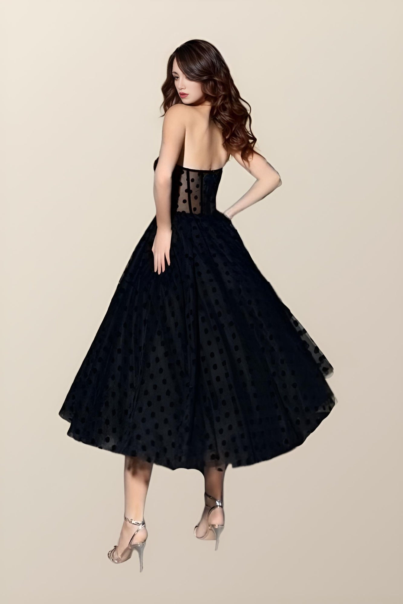 Back view of Miranda Formal Dress showcasing see-through bodice and polka dots