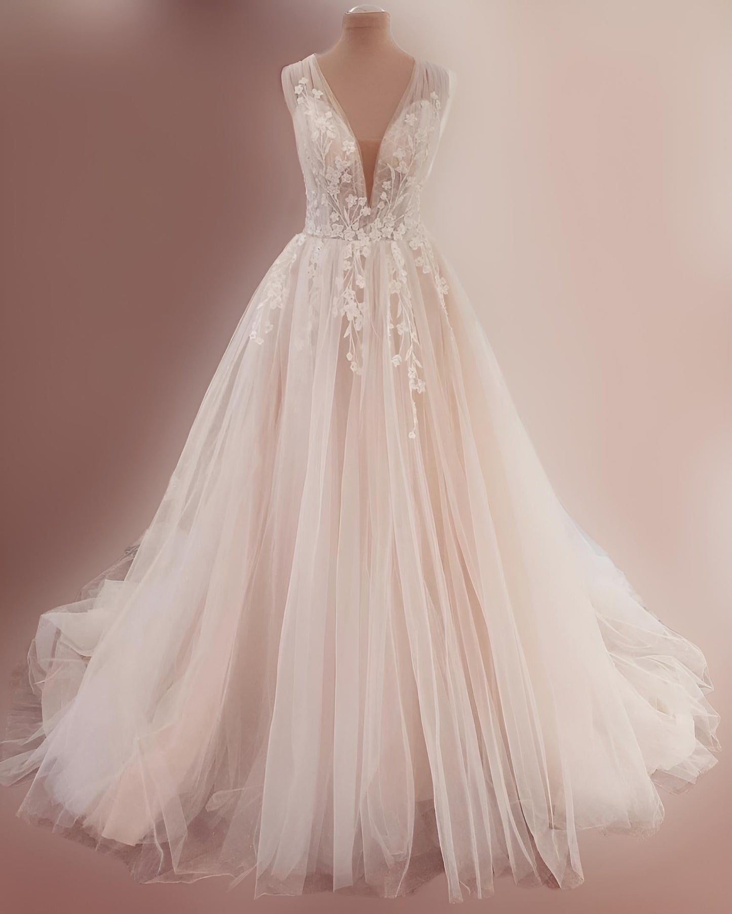 MIRIAM Wedding Dress with V-neckline and lace appliques on figurine