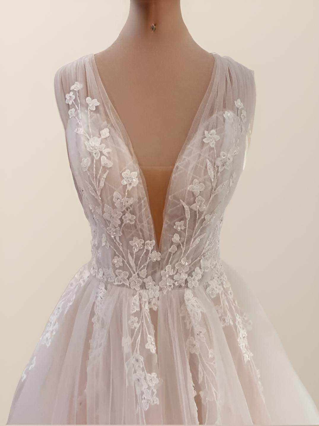Close-up of lace detailing and appliques on boho MIRIAM Wedding Gown