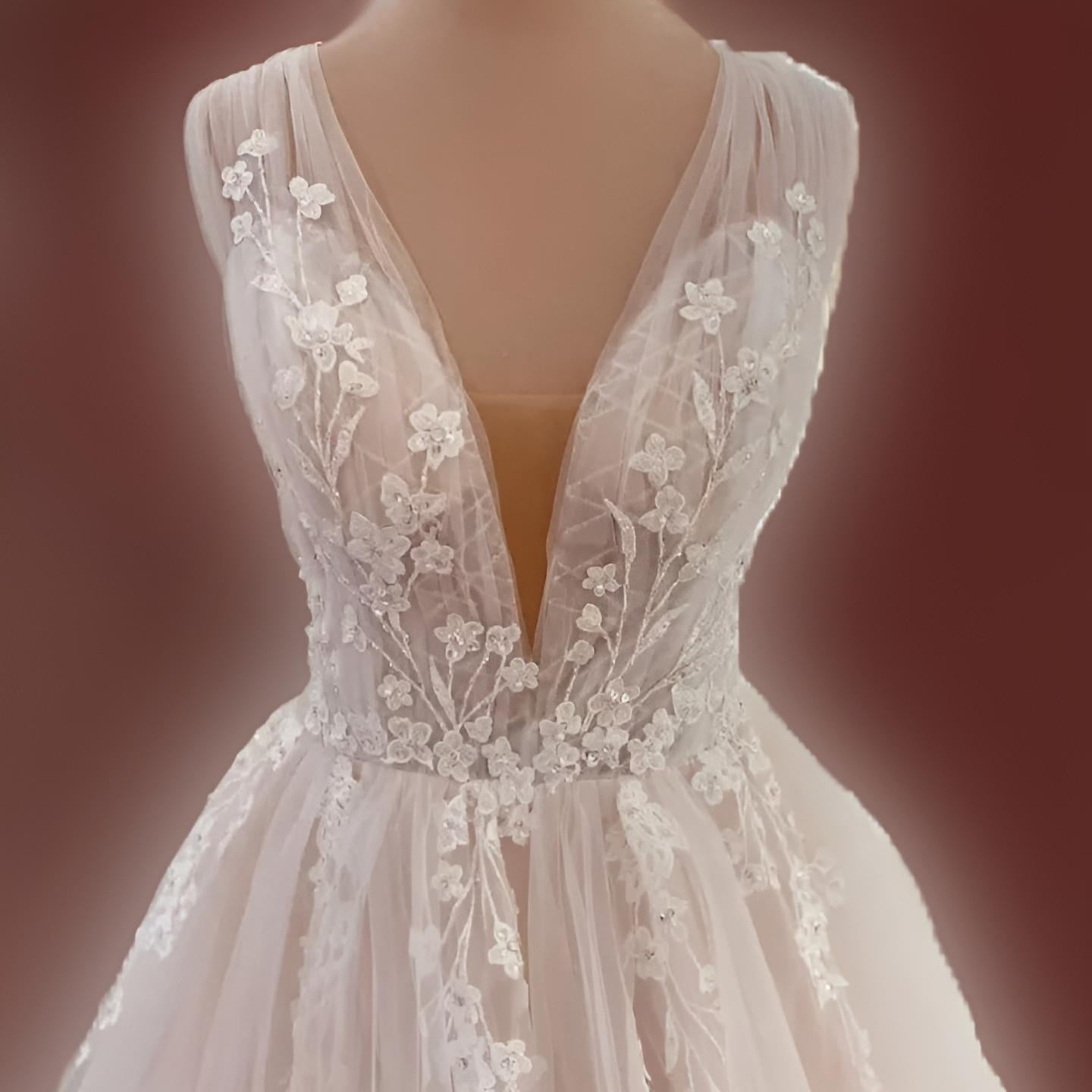 Close-up of lace detailing and appliques on MIRIAM Wedding Gown