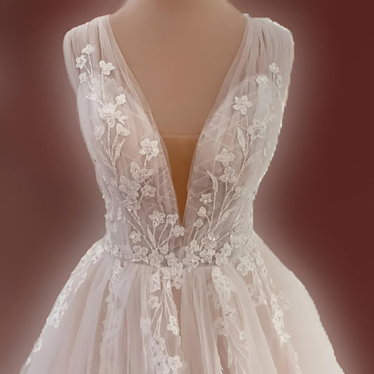 Close-up of lace detailing and appliques on MIRIAM Wedding Gown