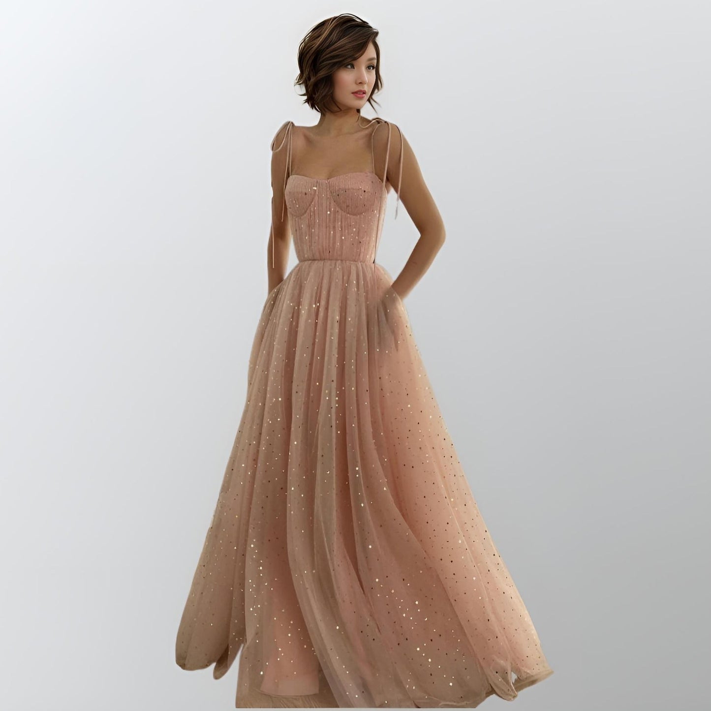 Woman wearing MYLEE Formal Dress in baby pink color with starry tulle