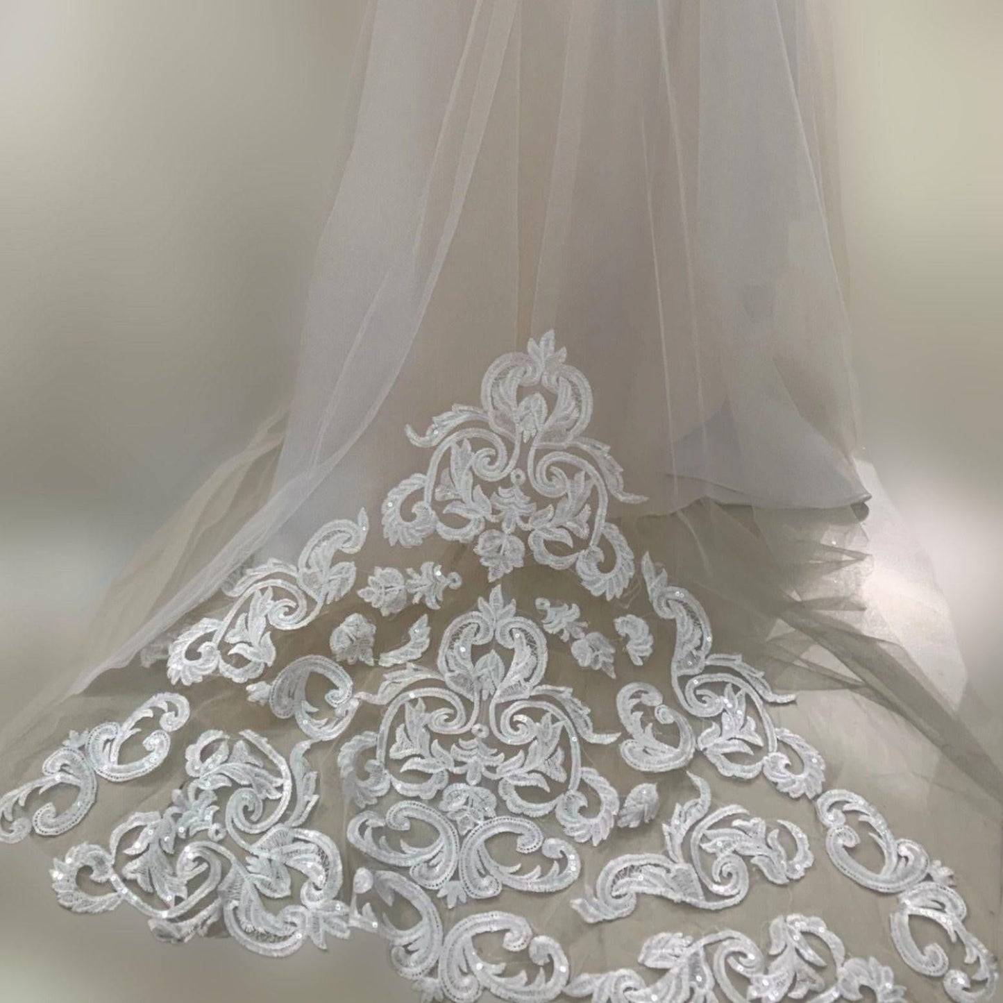 Back view of NOEMI Girl Dress showing detail of lace train