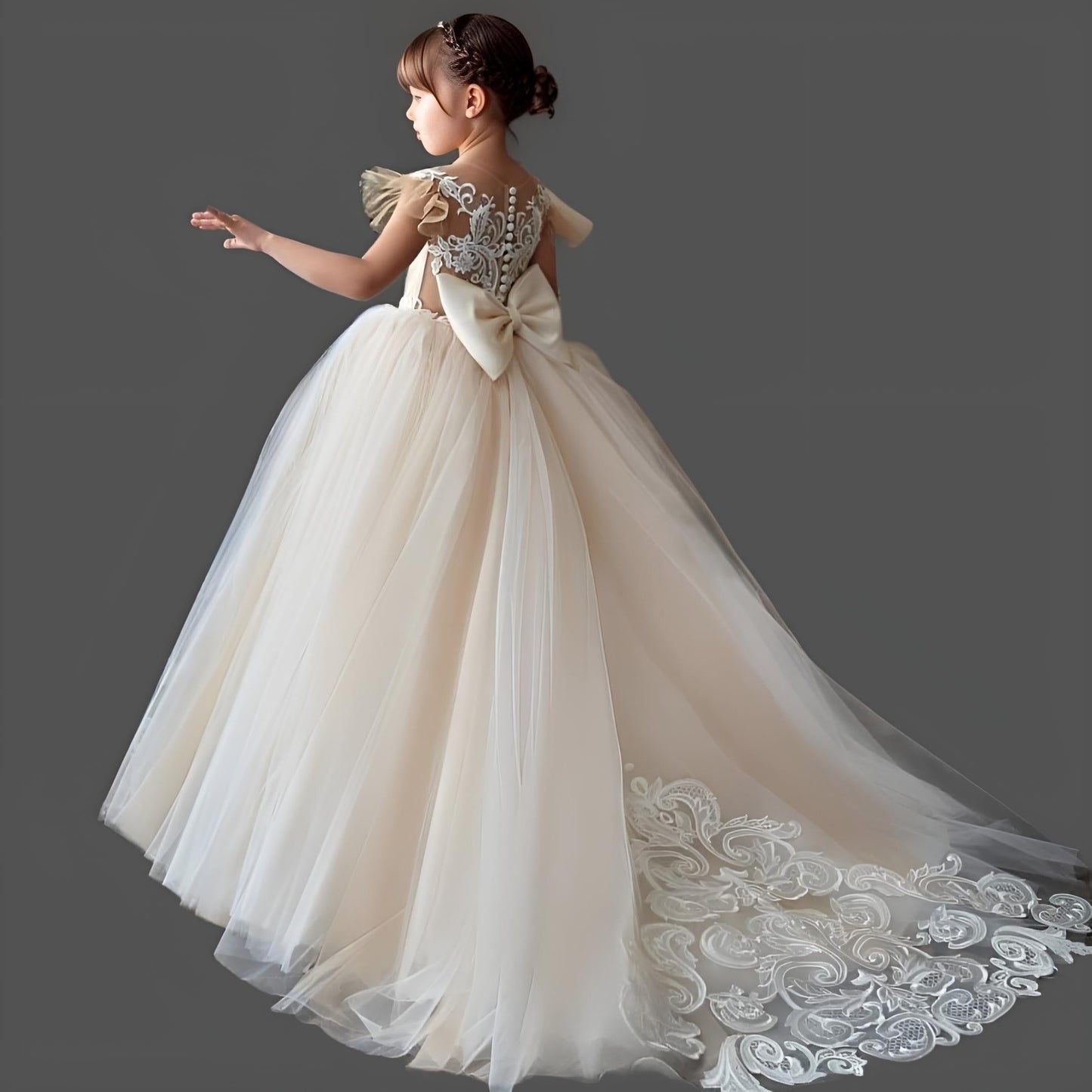 Full-length back view of NOEMI Girl Dress highlighting ball gown silhouette