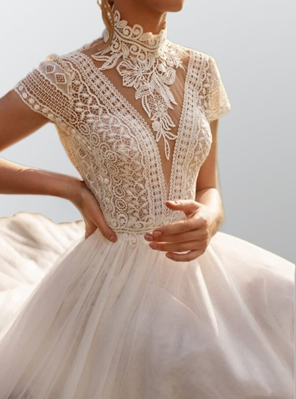 Close-up of lace detailing on NOVA Wedding Dress cap sleeves and bodice.