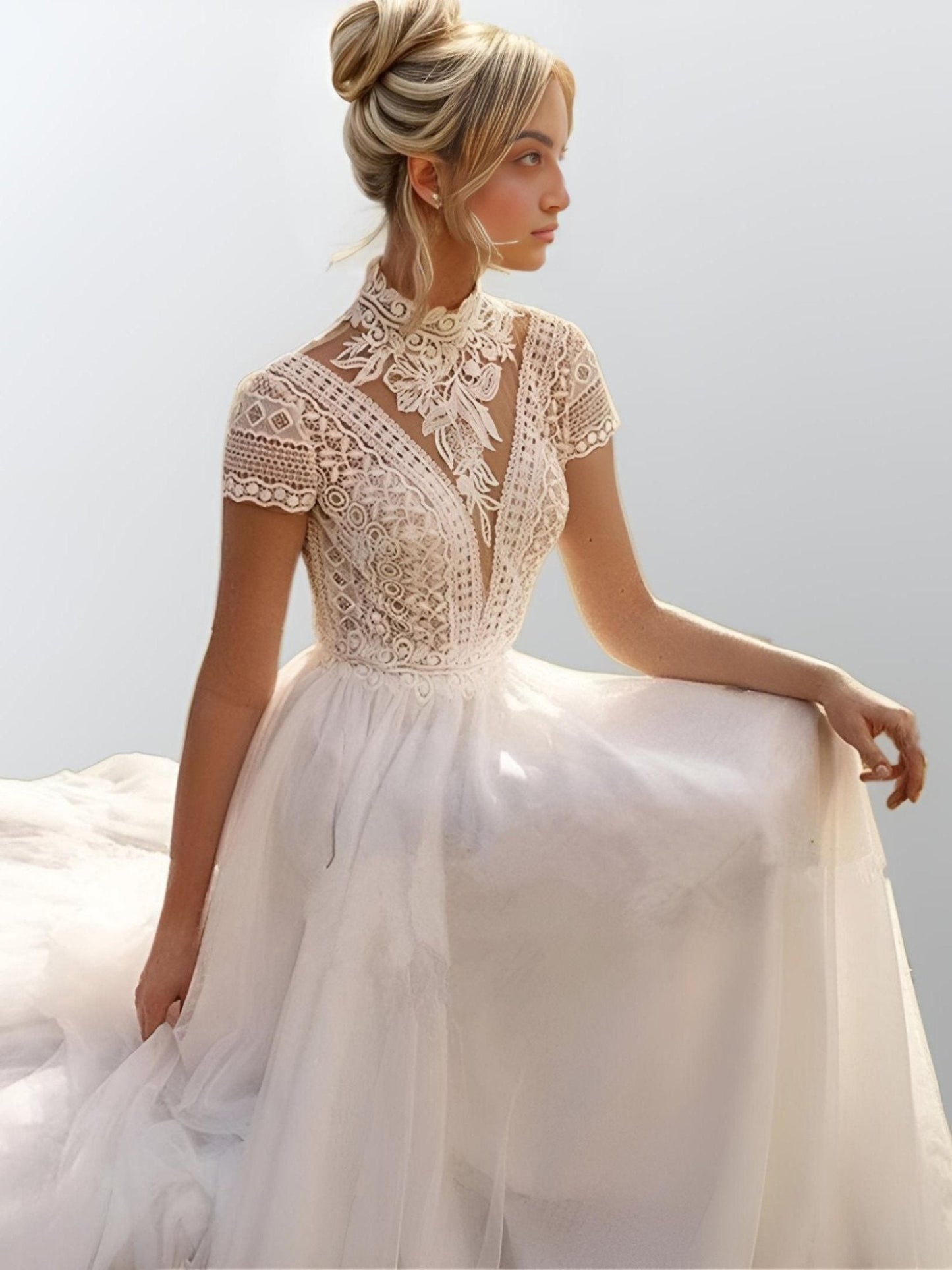 Close-up of lace detailing of bohemian NOVA Wedding Dress cap sleeves and lace bodice