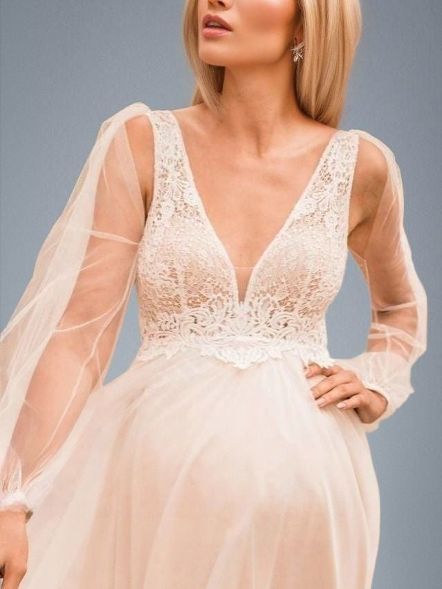 Detail View of Detachable Long Puff Sleeve on Pregnant Bride's Wedding Dress