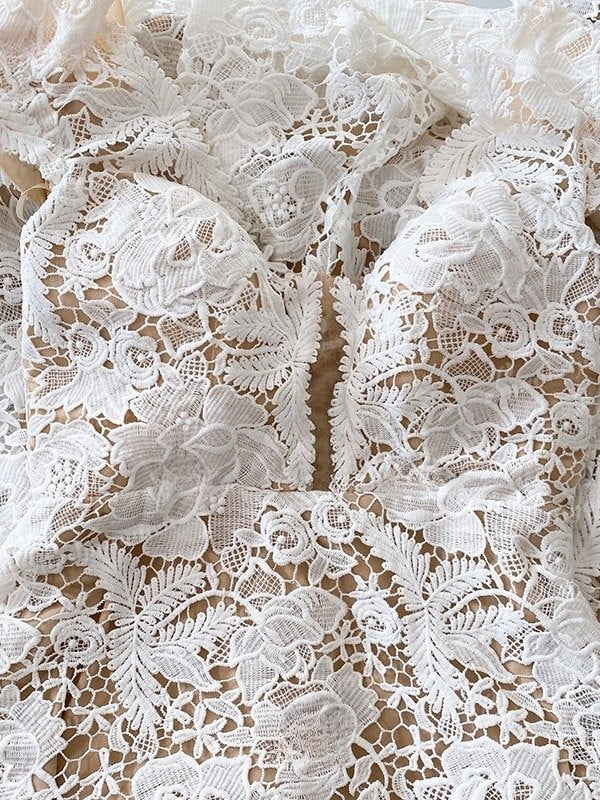 Close-up of PARIS wedding dress showcasing romantic lace details